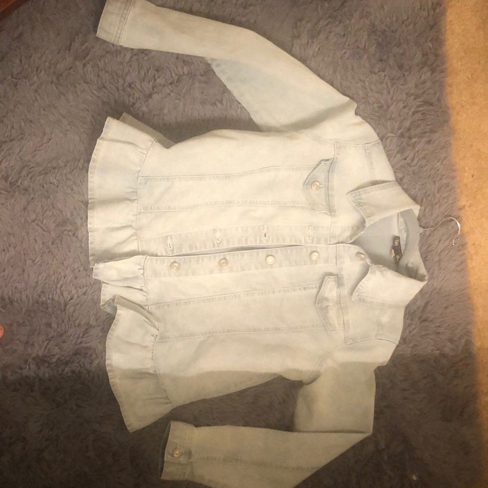 Jean jacket with ruffled edges never worn